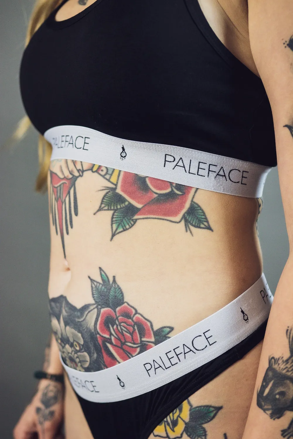 Paleface Swiss PLFC sporttop crop top zwart racerback